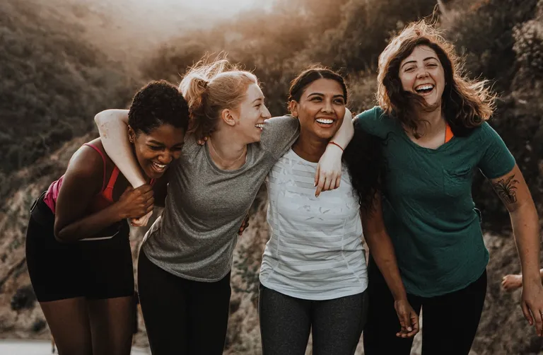 Friends hiking through the hills