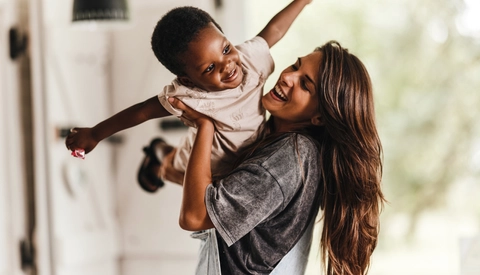 Mother playing with son