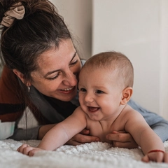 Mother with happy newborn