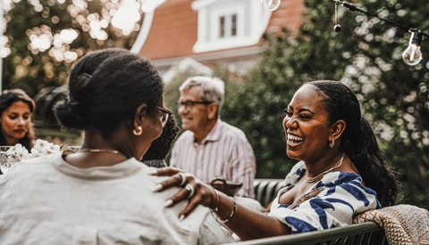 People smiling outside 