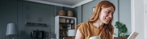 Woman managing her health insurance from a tablet