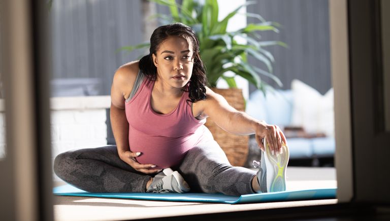 Pregnant woman stretching