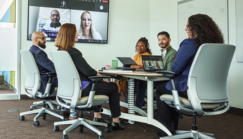 Hybrid meeting in corporate workspace