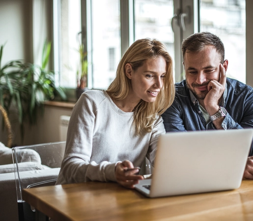 Woman spending time on the internet with her husband