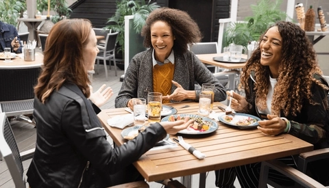 Happy group of friends in a restaurant