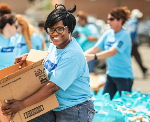 A group of TeamBlue volunteers at an event