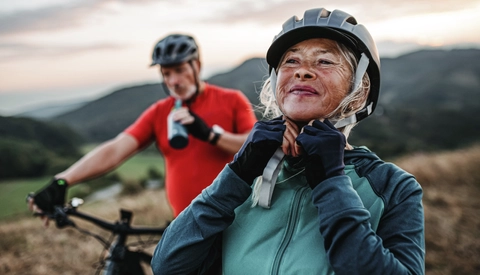 Portrait of senior couple on bike ride