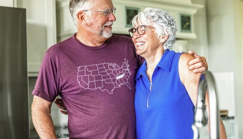 Senior Tennessee couple living life in retirement, senior man wearing a generic Tennessee shirt