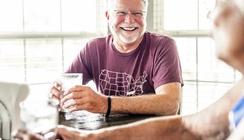 Senior Tennessee couple living life in retirement, senior man wearing a generic Tennessee shirt