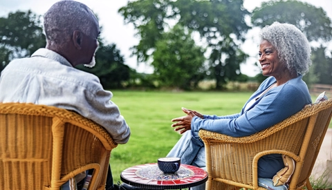 Senior couple relaxing on patio