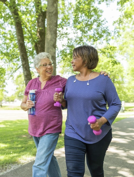 Two female friends exercising outdoors