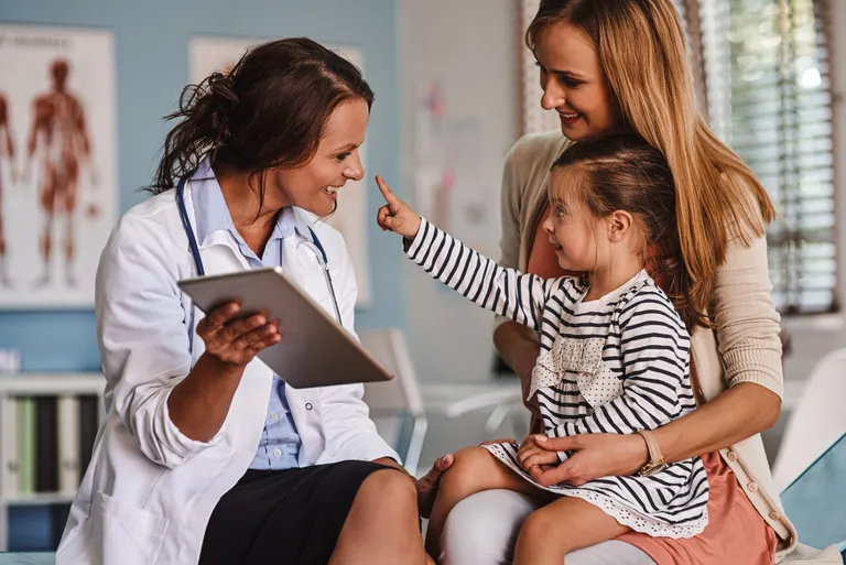 Pediatrician with Mother and Child