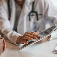 Physician using Digital Tablet