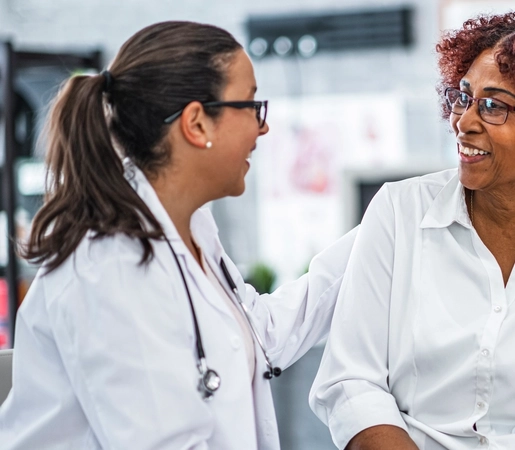 Female Physician Talking to Female Patient