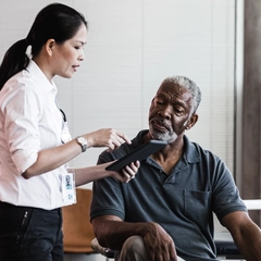 Female Doctor Talking to Male Patient