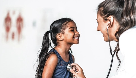 Young girl is examined by female doctor