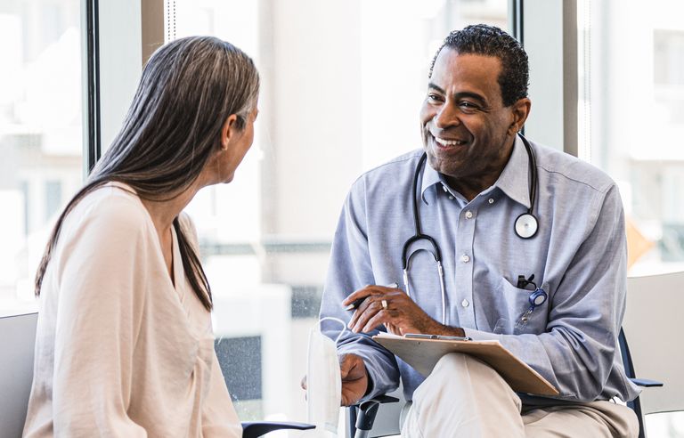 Doctor talking to patient