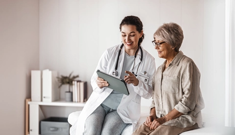 Patient with a doctor in medical office