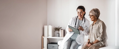 Patient with a doctor in medical office