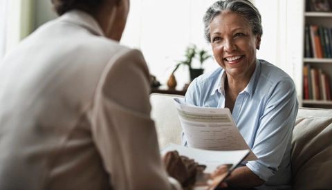 Hispanic patient talking to doctor